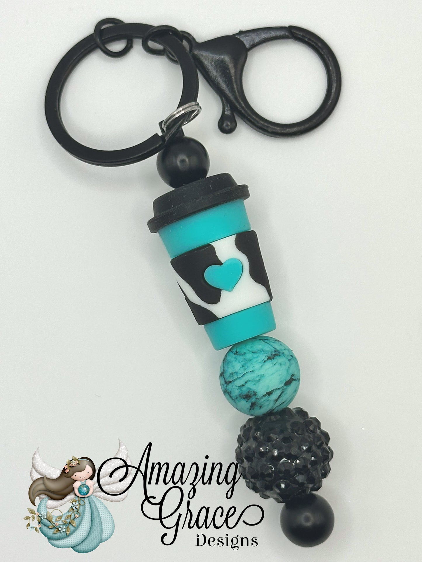 Turquoise Cow Print Coffee Keychain