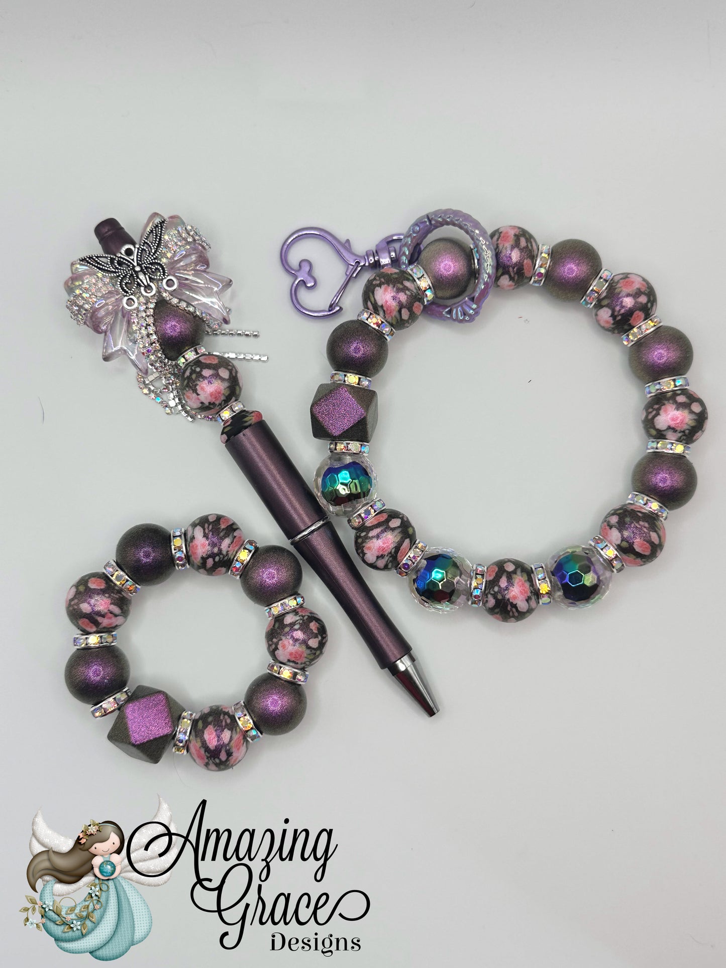 Three Piece Purple Floral Pen, Tumbler Handle Charm & Wristlet Set