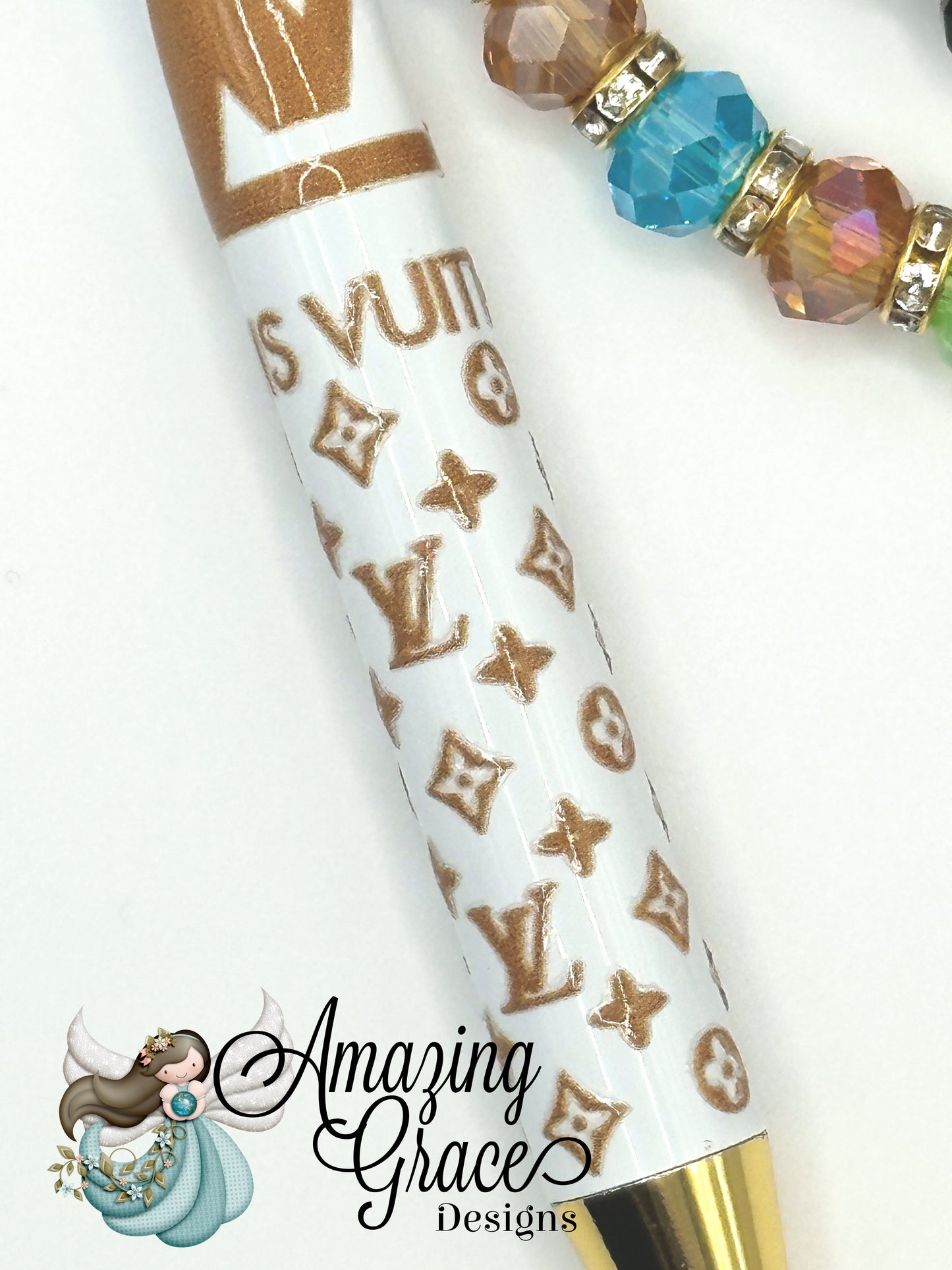 Patterned Pen and Multicolored Bracelet Set